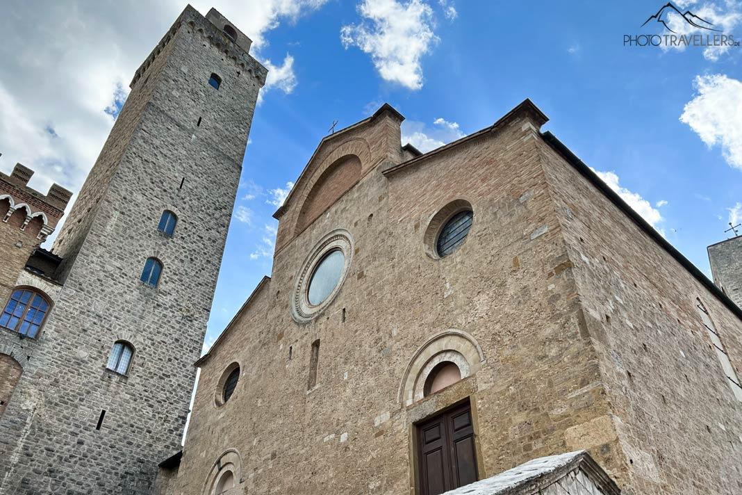 A Collegiata di Santa Maria Assunta com o Torre Grossa em San Gimignano