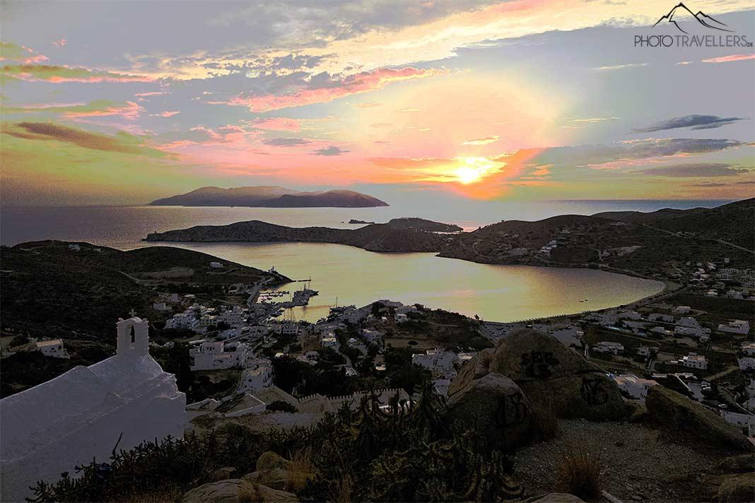 The bay of Gialos with the surrounding hills at sunset