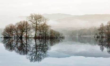 A thin dawn mist over Loch Lomond. Viewed from Balmaha on the east shore of the loch.