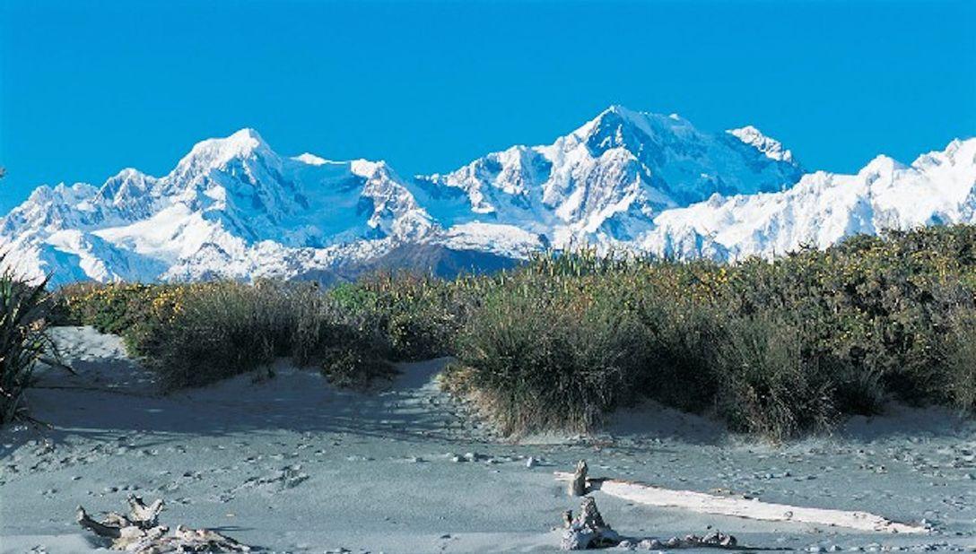 <strong>Gillespies Beach, West Coast: </strong>Based near an old mining settlement, this windswept and desolate coastline is covered with mounds of bleached driftwood and rocks.