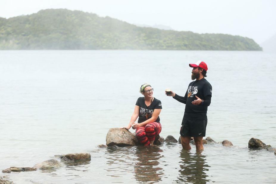 <strong>Hot Water Beach, Waikato:</strong> For around two hours before or after low tide, you can dig a hole at the tide line of this gorgeous beach and relax in a personal, natural hot springs spa.