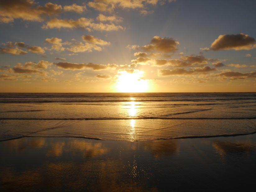 <strong>Piha Beach, Auckland: </strong> The country's most famous surfing beach is also considered one of its best beaches thanks to its rugged cliffs, the commanding Lion Rock standing guard and the bush of the Waitakere Ranges.