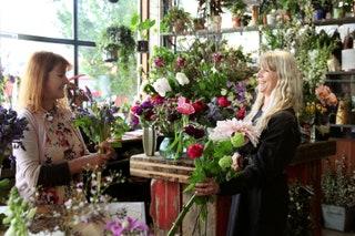Someone buying flowers from Rebel Rebel in Hackney