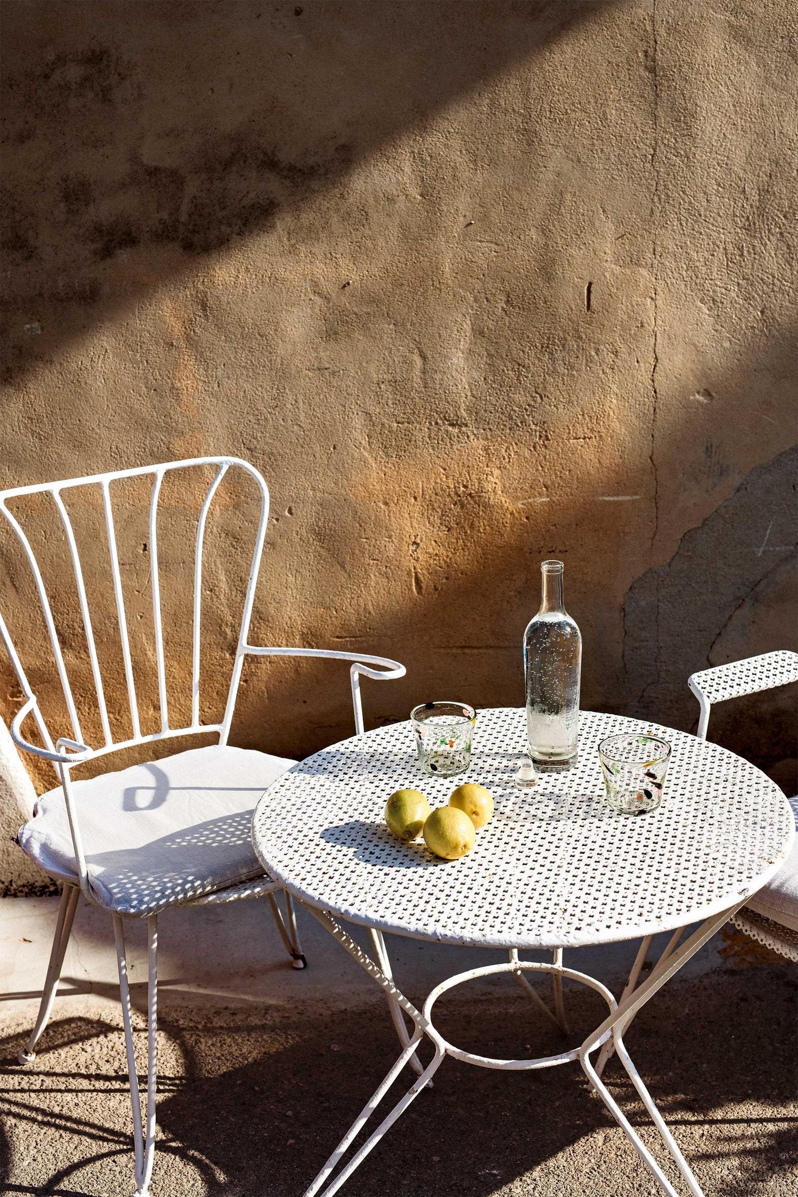 Table and chairs at Ca Na Toneta